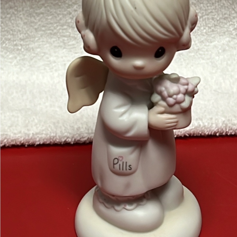 Precious Moments Angel with Flower Basket Nurse